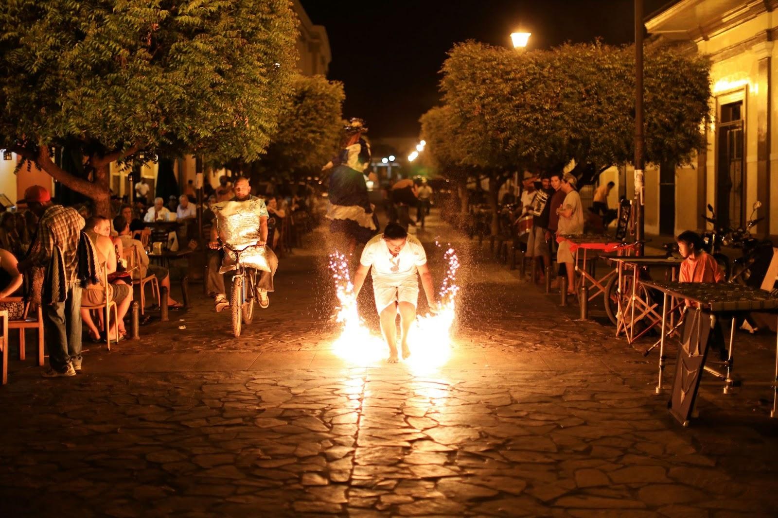 Granada, Nicaragua. Man holding a sparkler on the street