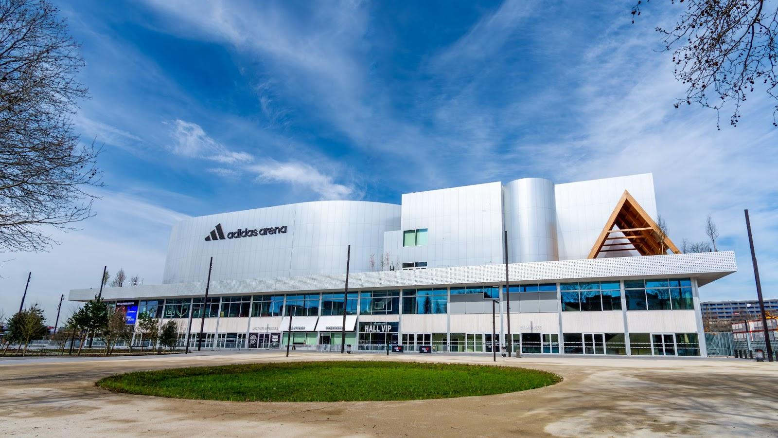 Exterior view of the Adidas Arena, also known as Arena Porte de la Chapelle, a multipurpose hall hosting sporting events and concerts, and an olympic venue
