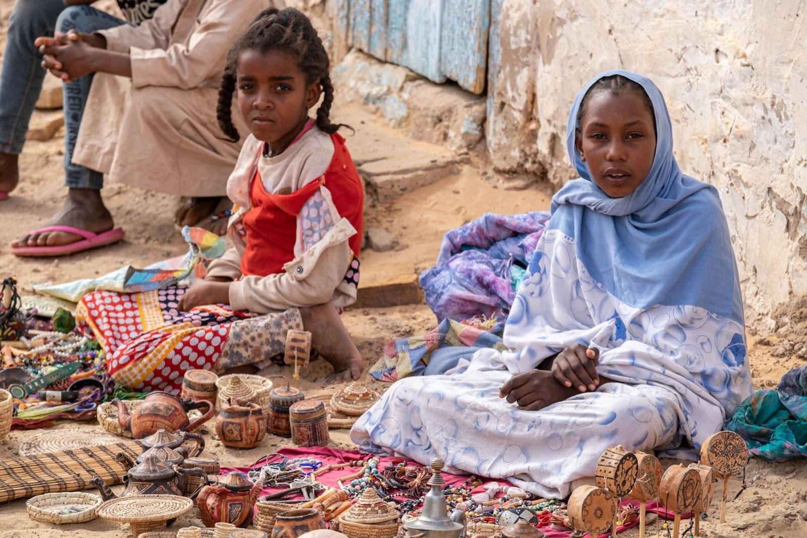 Ouadane, Mauritania. young woman at a local market.