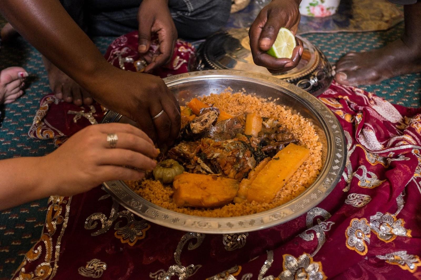 People Eating Traditional Mauritanian Meal with Hands