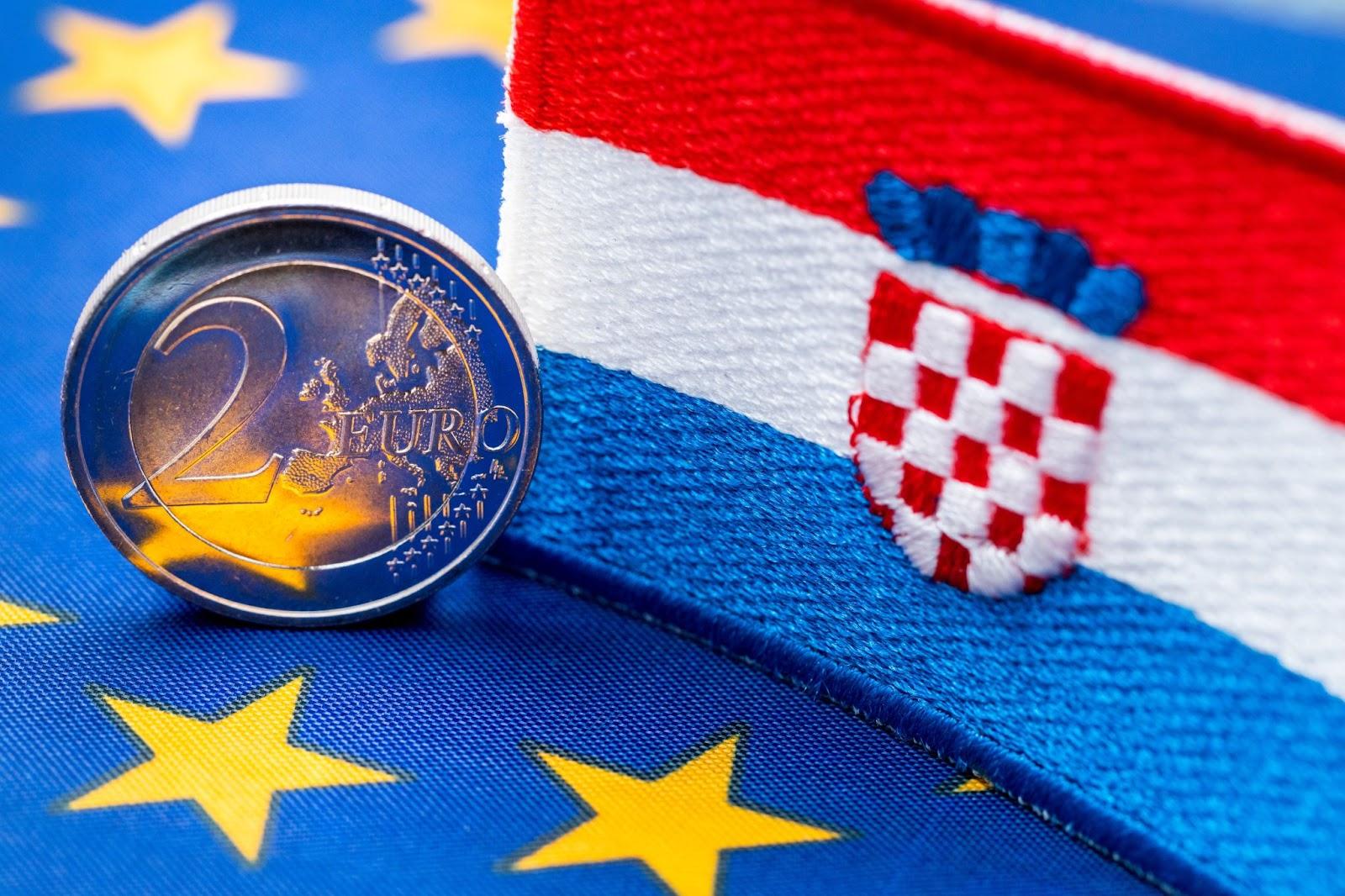 The flag of Croatia against the background of the single currency of the European Union, The concept of Croatia joining the Euro zone, economic and political background