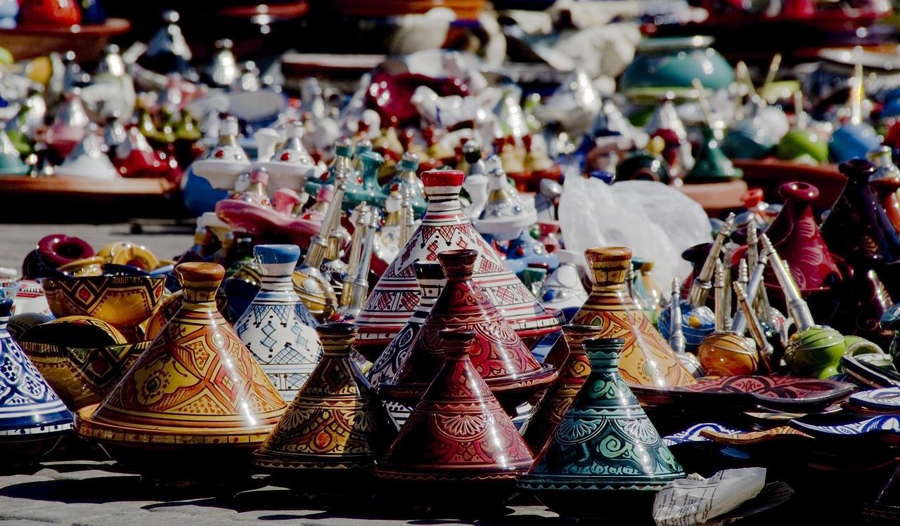 Multicoloured tagines on a market stall in. Buy with Moroccan dirham (MAD)