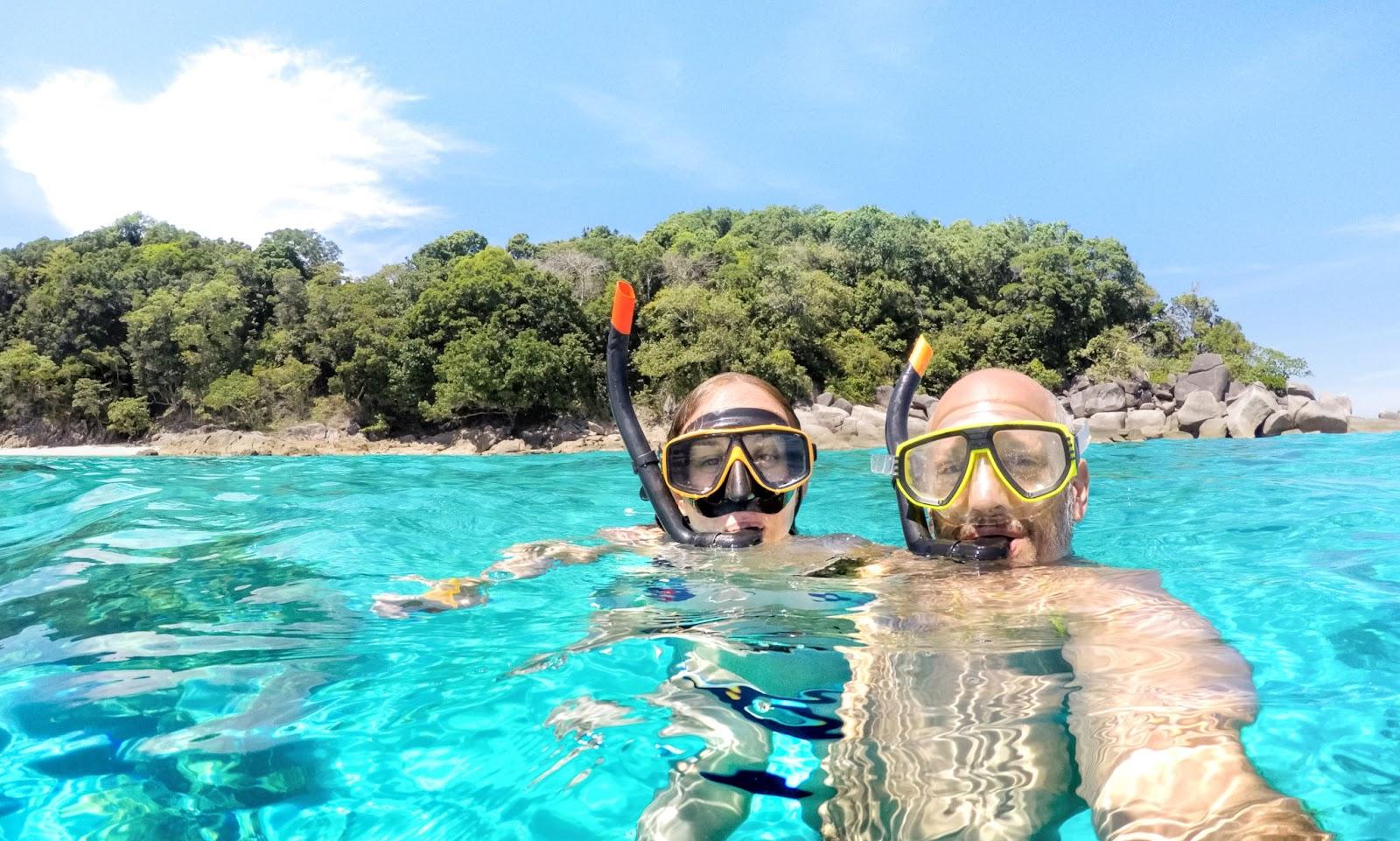 Couple snorkelling taking a selfie