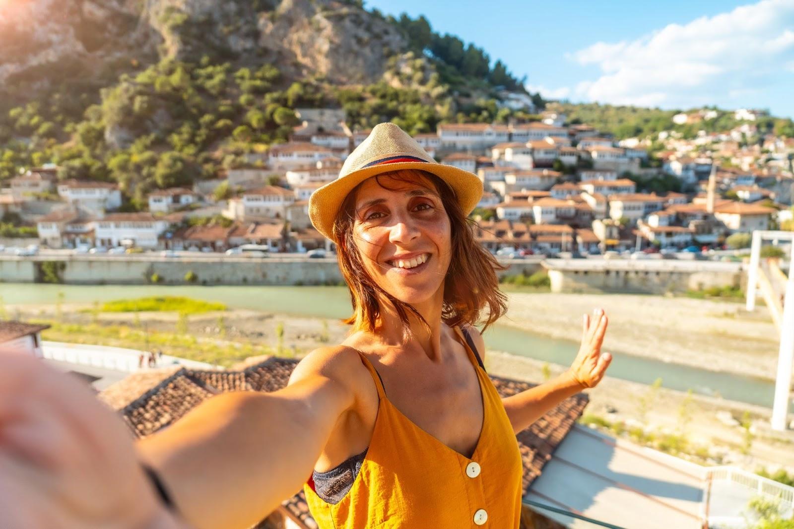 Selfie of a young woman in the historic town of Berat