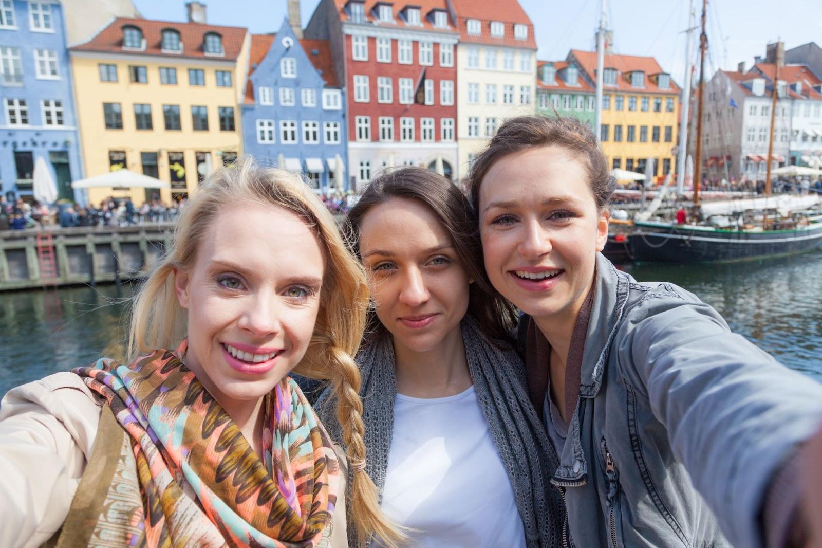 3 women smiling taking a selfie in Copenhagen 