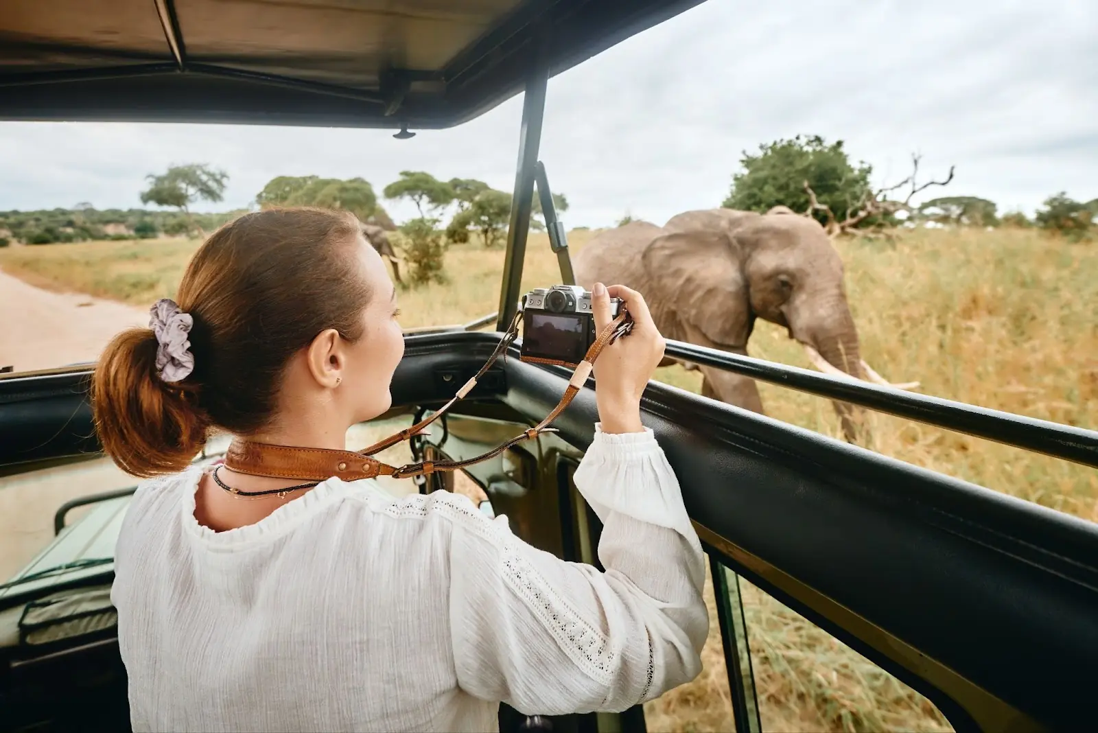 Woman tourist on safari in Kenya.