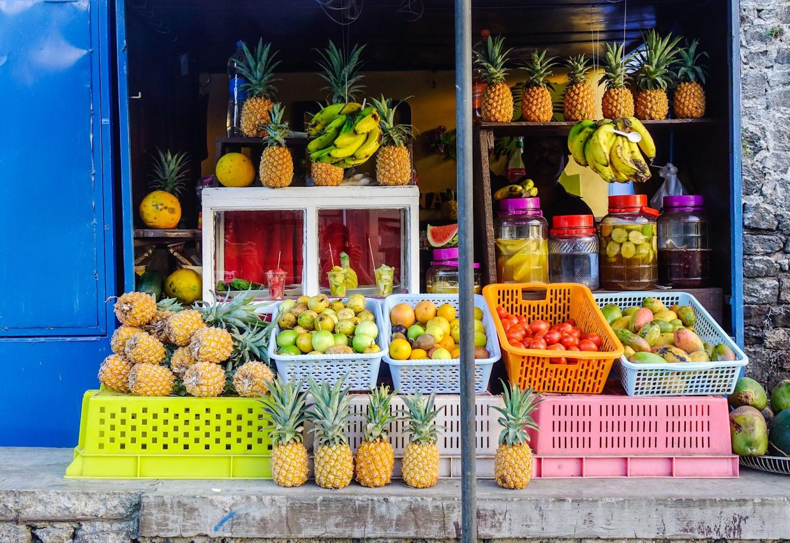 A fruit store at downtown in Port Louis, Mauritius. Buy Mauritian Rupees before you depart 