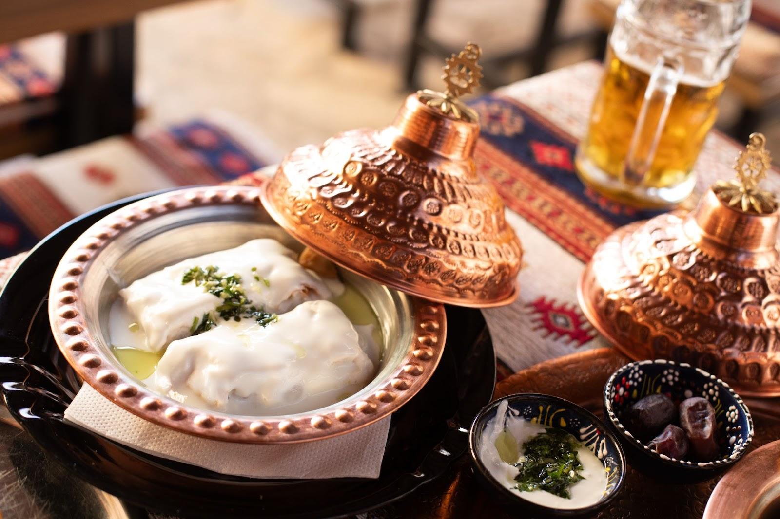 Buredzici- traditional savoury pastry- phyllo dough that is stuffed with minced meat. Buredzici are coated with a combination of sliced garlic and sour cream. 