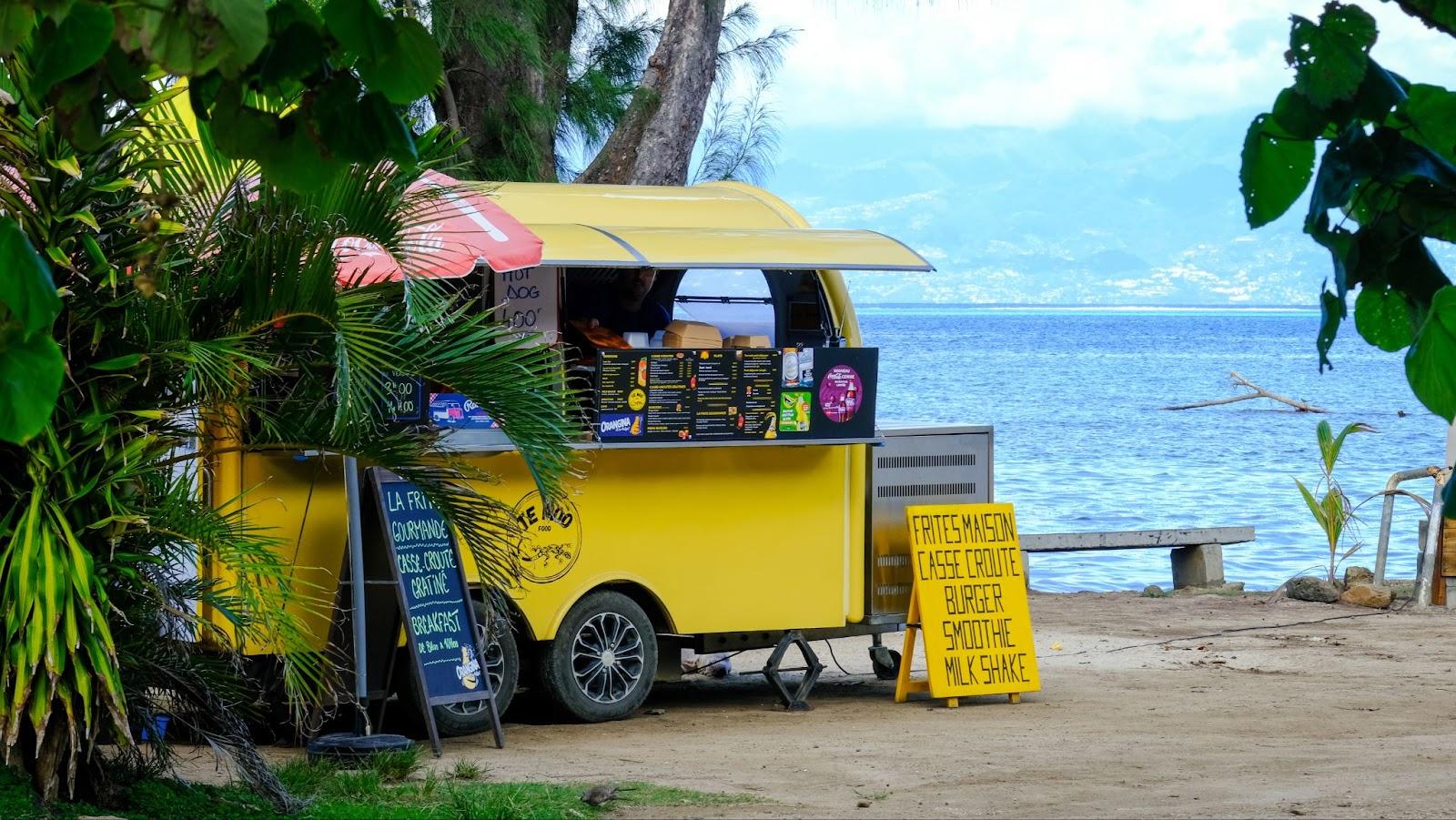 bright yellow snack bar cafe with ocean views